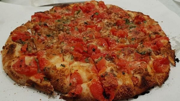 La Tradizione della Rianata: La Pizza Trapanese Che Celebra Trapani