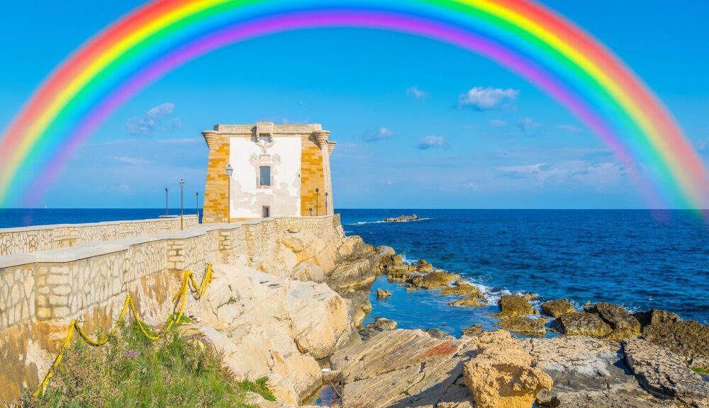 Torre di Ligny a Trapani con grande arcobaleno Pride nel cielo