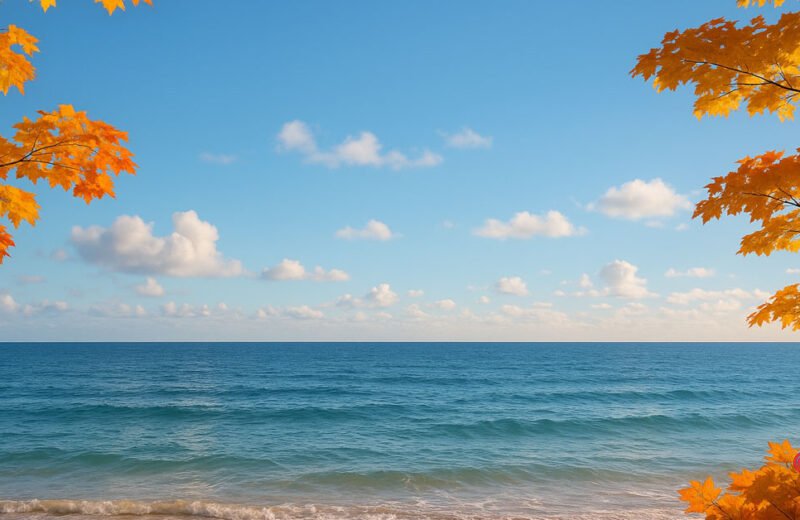 mare d’autunno con foglie dorate e cielo limpido